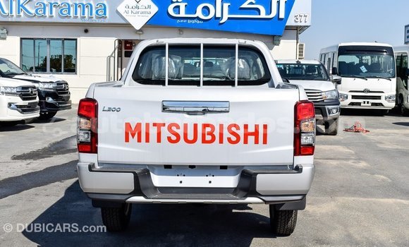 Buy Import Mitsubishi L200 White Car in Import - Dubai in Barbados Buy Import Mitsubishi L200 White Car in Import - Dubai in Barbados