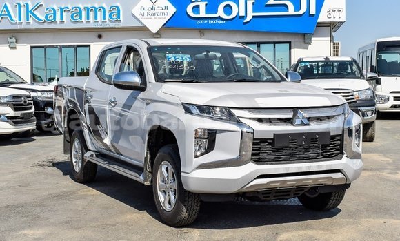 Buy Import Mitsubishi L200 White Car in Import - Dubai in Barbados Buy Import Mitsubishi L200 White Car in Import - Dubai in Barbados