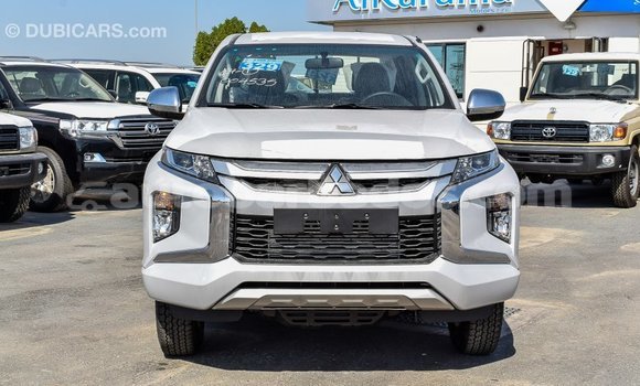 Buy Import Mitsubishi L200 White Car in Import - Dubai in Barbados Buy Import Mitsubishi L200 White Car in Import - Dubai in Barbados