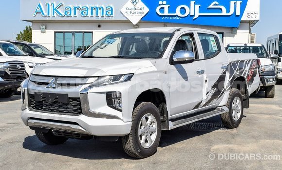 Buy Import Mitsubishi L200 White Car in Import - Dubai in Barbados Buy Import Mitsubishi L200 White Car in Import - Dubai in Barbados