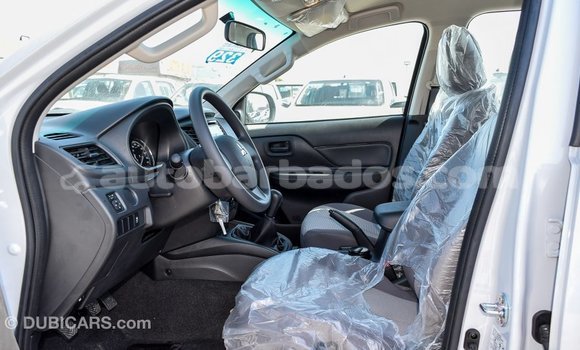 Buy Import Mitsubishi L200 White Car in Import - Dubai in Barbados Buy Import Mitsubishi L200 White Car in Import - Dubai in Barbados