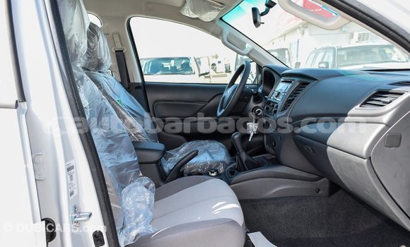 Buy Import Mitsubishi L200 White Car in Import - Dubai in Barbados Buy Import Mitsubishi L200 White Car in Import - Dubai in Barbados