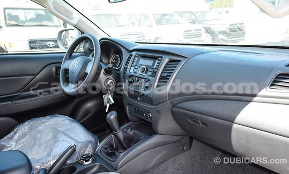Buy Import Mitsubishi L200 White Car in Import - Dubai in Barbados Buy Import Mitsubishi L200 White Car in Import - Dubai in Barbados