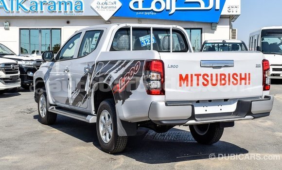 Buy Import Mitsubishi L200 White Car in Import - Dubai in Barbados Buy Import Mitsubishi L200 White Car in Import - Dubai in Barbados
