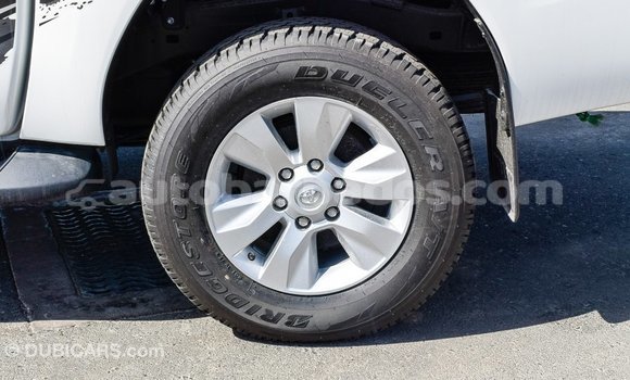 Buy Import Toyota Hilux White Car in Import - Dubai in Barbados Buy Import Toyota Hilux White Car in Import - Dubai in Barbados