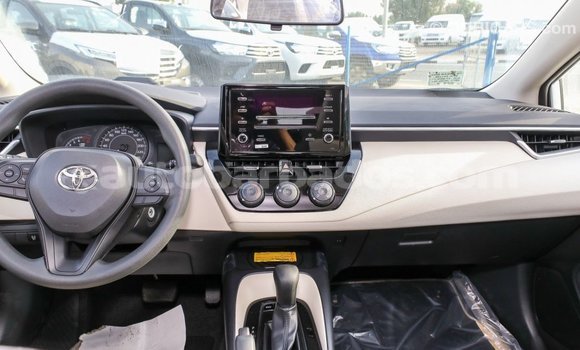 Buy Import Toyota Corolla White Car in Import - Dubai in Barbados Buy Import Toyota Corolla White Car in Import - Dubai in Barbados