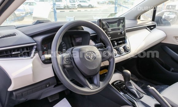 Buy Import Toyota Corolla White Car in Import - Dubai in Barbados Buy Import Toyota Corolla White Car in Import - Dubai in Barbados