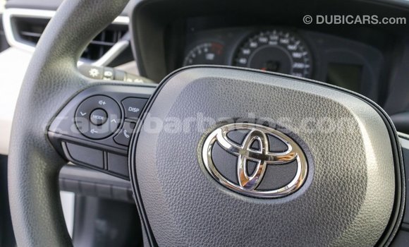 Buy Import Toyota Corolla White Car in Import - Dubai in Barbados Buy Import Toyota Corolla White Car in Import - Dubai in Barbados
