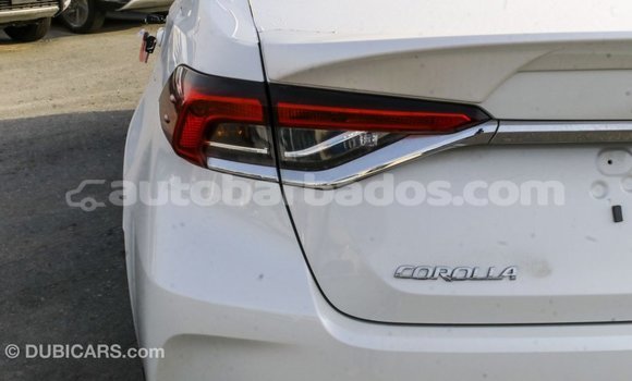 Buy Import Toyota Corolla White Car in Import - Dubai in Barbados Buy Import Toyota Corolla White Car in Import - Dubai in Barbados