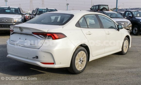 Buy Import Toyota Corolla White Car in Import - Dubai in Barbados Buy Import Toyota Corolla White Car in Import - Dubai in Barbados