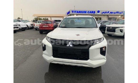 Buy Import Mitsubishi L200 White Car in Import - Dubai in Barbados Buy Import Mitsubishi L200 White Car in Import - Dubai in Barbados