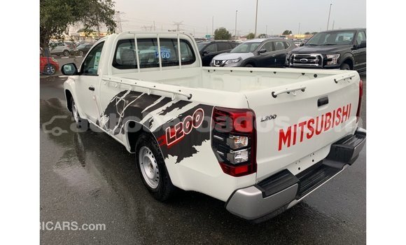 Buy Import Mitsubishi L200 White Car in Import - Dubai in Barbados Buy Import Mitsubishi L200 White Car in Import - Dubai in Barbados
