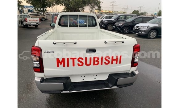 Buy Import Mitsubishi L200 White Car in Import - Dubai in Barbados Buy Import Mitsubishi L200 White Car in Import - Dubai in Barbados