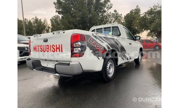Buy Import Mitsubishi L200 White Car in Import - Dubai in Barbados Buy Import Mitsubishi L200 White Car in Import - Dubai in Barbados