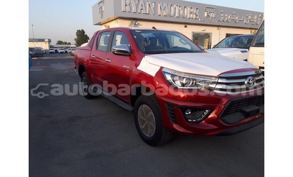 Buy Import Toyota Hilux Red Car in Import - Dubai in Barbados Buy Import Toyota Hilux Red Car in Import - Dubai in Barbados