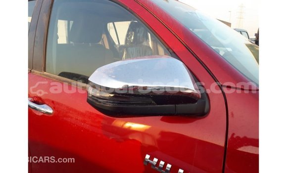 Buy Import Toyota Hilux Red Car in Import - Dubai in Barbados Buy Import Toyota Hilux Red Car in Import - Dubai in Barbados