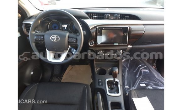 Buy Import Toyota Hilux Red Car in Import - Dubai in Barbados Buy Import Toyota Hilux Red Car in Import - Dubai in Barbados