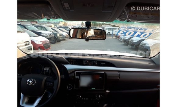 Buy Import Toyota Hilux Red Car in Import - Dubai in Barbados Buy Import Toyota Hilux Red Car in Import - Dubai in Barbados