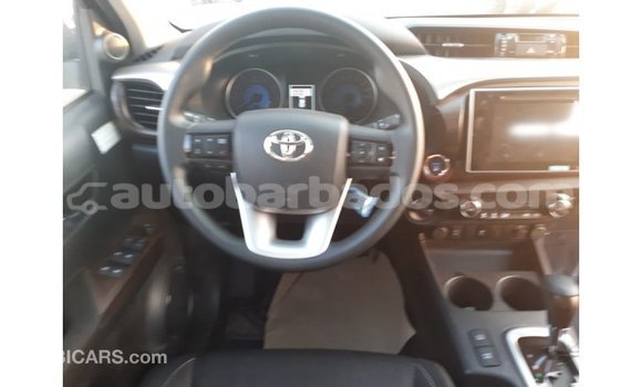 Buy Import Toyota Hilux Red Car in Import - Dubai in Barbados Buy Import Toyota Hilux Red Car in Import - Dubai in Barbados