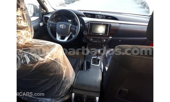 Buy Import Toyota Hilux Red Car in Import - Dubai in Barbados Buy Import Toyota Hilux Red Car in Import - Dubai in Barbados