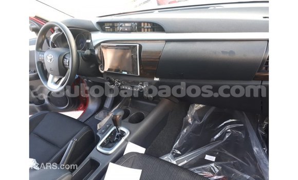 Buy Import Toyota Hilux Red Car in Import - Dubai in Barbados Buy Import Toyota Hilux Red Car in Import - Dubai in Barbados