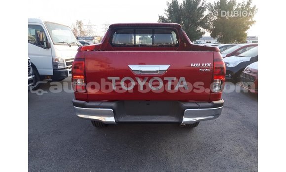Buy Import Toyota Hilux Red Car in Import - Dubai in Barbados Buy Import Toyota Hilux Red Car in Import - Dubai in Barbados