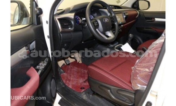 Buy Import Toyota Hilux White Car in Import - Dubai in Barbados Buy Import Toyota Hilux White Car in Import - Dubai in Barbados