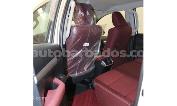 Buy Import Toyota Hilux White Car in Import - Dubai in Barbados Buy Import Toyota Hilux White Car in Import - Dubai in Barbados
