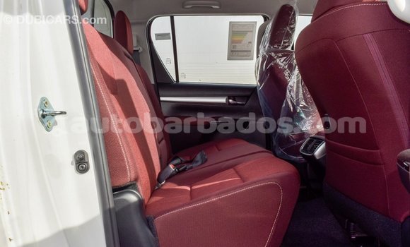 Buy Import Toyota Hilux White Car in Import - Dubai in Barbados Buy Import Toyota Hilux White Car in Import - Dubai in Barbados
