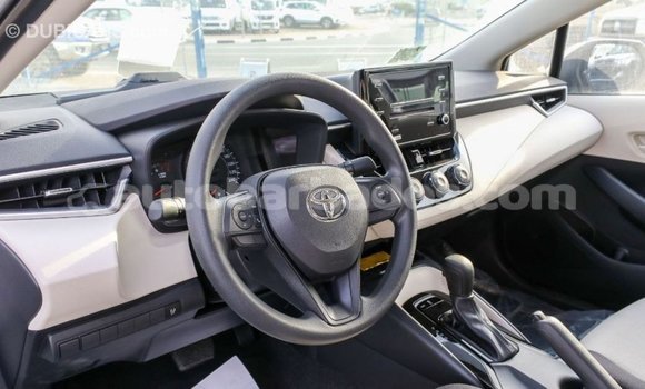 Buy Import Toyota Corolla White Car in Import - Dubai in Barbados Buy Import Toyota Corolla White Car in Import - Dubai in Barbados