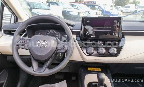 Buy Import Toyota Corolla White Car in Import - Dubai in Barbados Buy Import Toyota Corolla White Car in Import - Dubai in Barbados