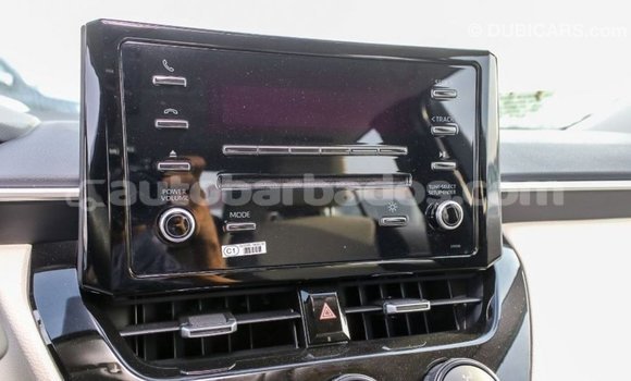 Buy Import Toyota Corolla White Car in Import - Dubai in Barbados Buy Import Toyota Corolla White Car in Import - Dubai in Barbados