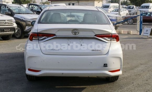 Buy Import Toyota Corolla White Car in Import - Dubai in Barbados Buy Import Toyota Corolla White Car in Import - Dubai in Barbados