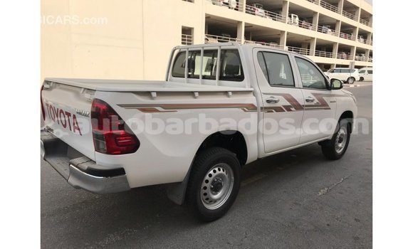 Buy Import Toyota Hilux White Car in Import - Dubai in Barbados Buy Import Toyota Hilux White Car in Import - Dubai in Barbados