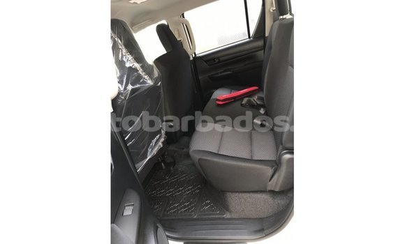 Buy Import Toyota Hilux White Car in Import - Dubai in Barbados Buy Import Toyota Hilux White Car in Import - Dubai in Barbados