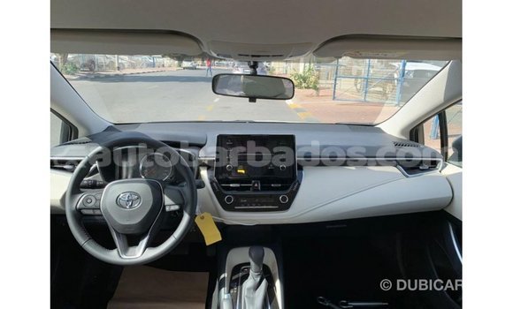 Buy Import Toyota Corolla White Car in Import - Dubai in Barbados Buy Import Toyota Corolla White Car in Import - Dubai in Barbados
