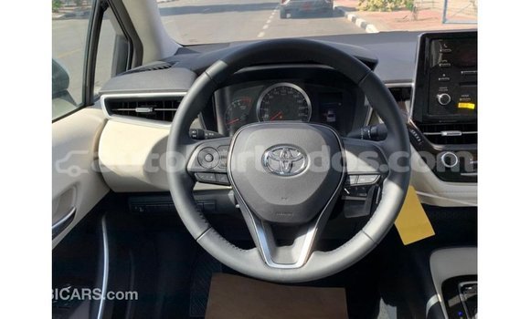 Buy Import Toyota Corolla White Car in Import - Dubai in Barbados Buy Import Toyota Corolla White Car in Import - Dubai in Barbados