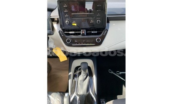 Buy Import Toyota Corolla White Car in Import - Dubai in Barbados Buy Import Toyota Corolla White Car in Import - Dubai in Barbados