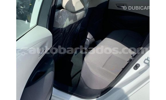 Buy Import Toyota Corolla White Car in Import - Dubai in Barbados Buy Import Toyota Corolla White Car in Import - Dubai in Barbados