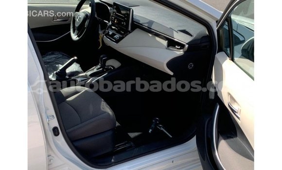 Buy Import Toyota Corolla White Car in Import - Dubai in Barbados Buy Import Toyota Corolla White Car in Import - Dubai in Barbados