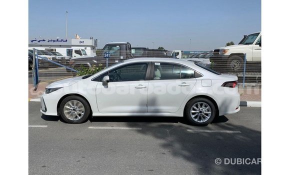 Buy Import Toyota Corolla White Car in Import - Dubai in Barbados Buy Import Toyota Corolla White Car in Import - Dubai in Barbados