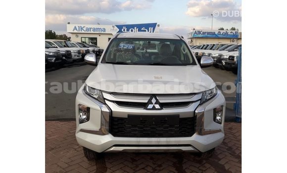 Buy Import Mitsubishi L200 White Car in Import - Dubai in Barbados Buy Import Mitsubishi L200 White Car in Import - Dubai in Barbados
