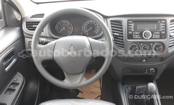 Buy Import Mitsubishi L200 White Car in Import - Dubai in Barbados Buy Import Mitsubishi L200 White Car in Import - Dubai in Barbados