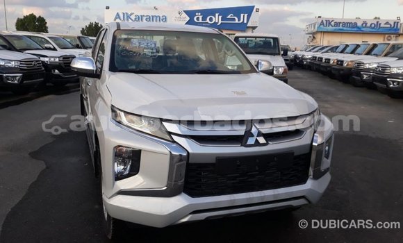 Buy Import Mitsubishi L200 White Car in Import - Dubai in Barbados Buy Import Mitsubishi L200 White Car in Import - Dubai in Barbados