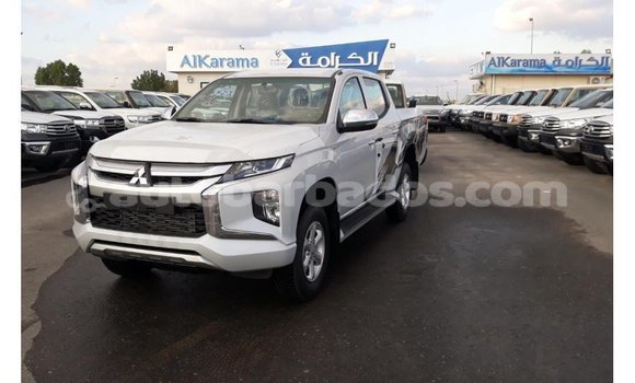 Buy Import Mitsubishi L200 White Car in Import - Dubai in Barbados Buy Import Mitsubishi L200 White Car in Import - Dubai in Barbados