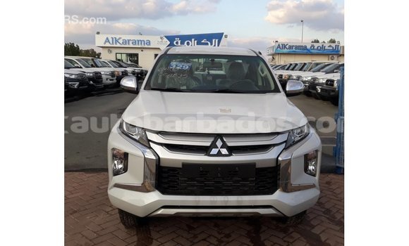 Buy Import Mitsubishi L200 White Car in Import - Dubai in Barbados Buy Import Mitsubishi L200 White Car in Import - Dubai in Barbados