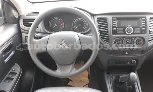 Buy Import Mitsubishi L200 White Car in Import - Dubai in Barbados Buy Import Mitsubishi L200 White Car in Import - Dubai in Barbados
