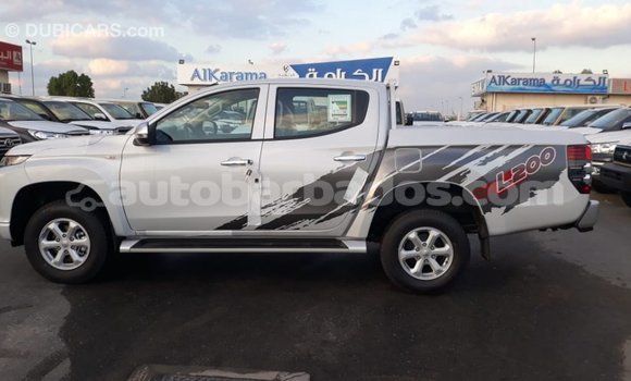 Buy Import Mitsubishi L200 White Car in Import - Dubai in Barbados Buy Import Mitsubishi L200 White Car in Import - Dubai in Barbados