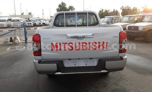 Buy Import Mitsubishi L200 White Car in Import - Dubai in Barbados Buy Import Mitsubishi L200 White Car in Import - Dubai in Barbados
