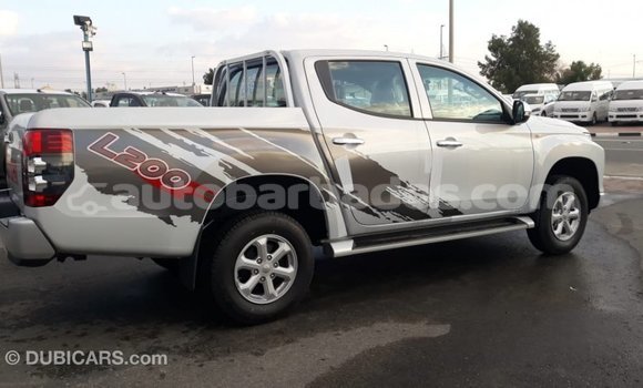 Buy Import Mitsubishi L200 White Car in Import - Dubai in Barbados Buy Import Mitsubishi L200 White Car in Import - Dubai in Barbados